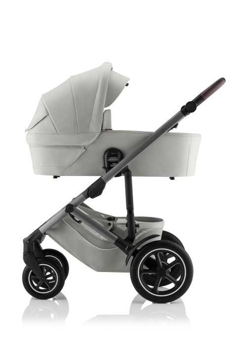 Britax Römer Smile 5Z gondola Linen Grey z brązową rączką, widok z boku.