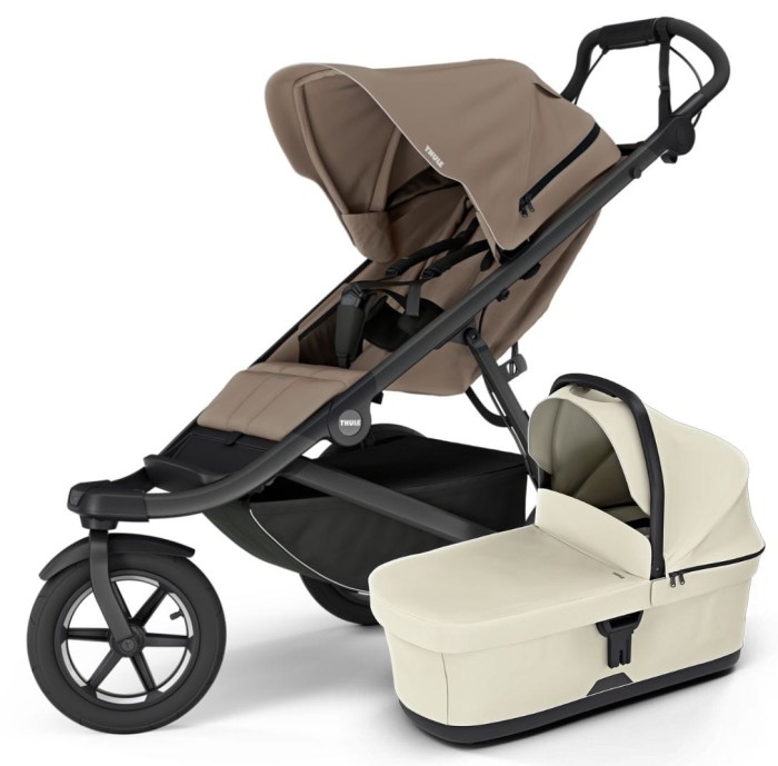 Wózek 2w1 Thule Urban Glide 3 Tined Taupe z gondolą w kolorze beżowym – elegancki wózek terenowy z dużymi kołami.