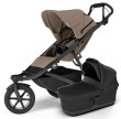 Thule Urban Glide 3 2w1 – gondola w kolorze czarnym z daszkiem przeciwsłonecznym, kompatybilna z wózkiem do biegania.