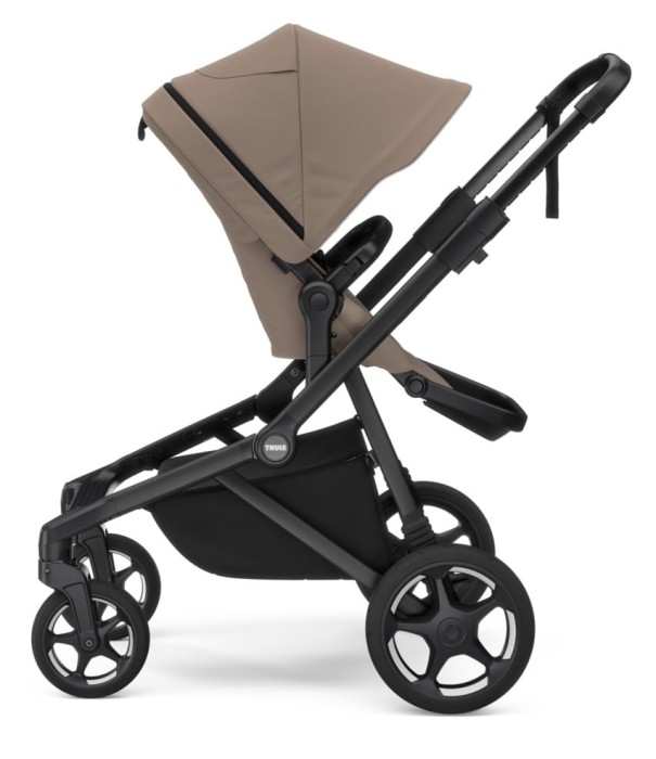 thule sleek 2 - wózek dziecięcy 2w1 - wersja spacerowa  - wózek z możliwością rozbudowy dla dwójki dzieci - kolor taupe (beż)  - widok od boku - tyłem do kierunku jady