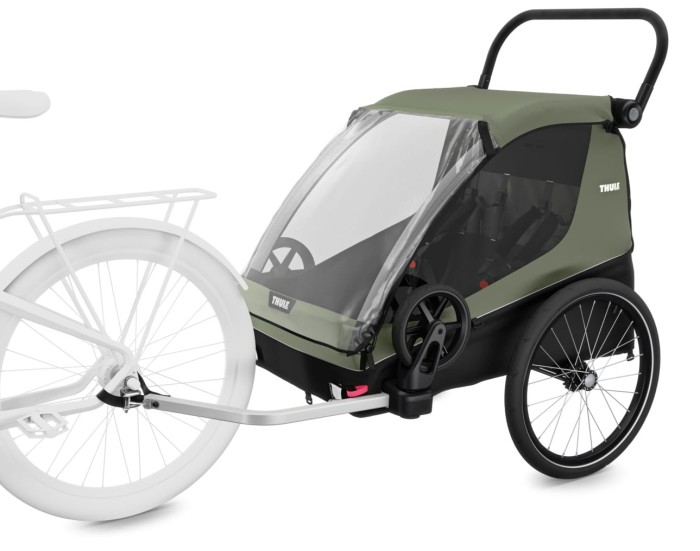 thule courier - przyczepka rowerowa - wersja z dyszlem mocowanym do roweru - kolor vintage green (zielony) - widok od boku
