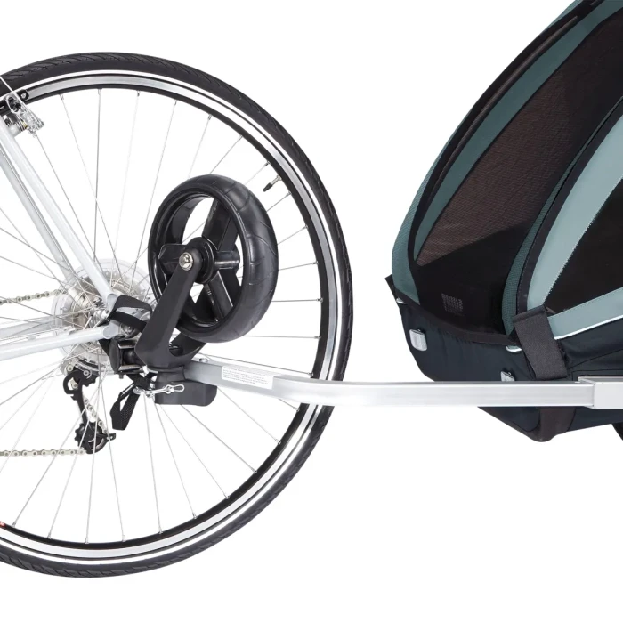 Thule Coaster XT kolor Jasnoniebieski - zdjęcie przyczepki podpiętej do roweru