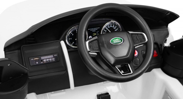 Land Rover Discovery dla dzieci Biały + Pilot + 5-pkt pasy + Regulacja siedzenia + EVA + MP3 LED-10 6974 