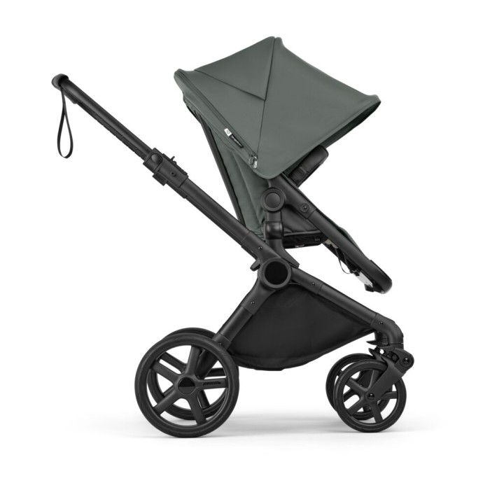 bugaboo cub - wózek dziecięcy 2w1 - wersja spacerowa, przodem do kierunku jazdy - widok od boku - kolor forest green (zielony)