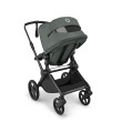 bugaboo cub - wózek dziecięcy 2w1 - wersja spacerowa, tyłem do kierunku jazdy - widok pod skosem, otwarta wentylacja - kolor forest green (zielony)