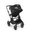 bugaboo cub - wózek dziecięcy 2w1 - wersja spacerowa, tyłem do kierunku jazdy - widok pod skosem, otwarta wentylacja - kolor heritage black (czarny)
