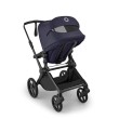 bugaboo cub - wózek dziecięcy 2w1 - wersja spacerowa, tyłem do kierunku jazdy - widok pod skosem, otwarta wentylacja - kolor deep indigo (granatowy)
